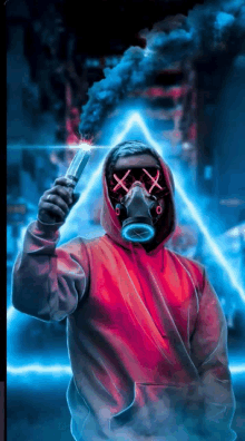 a person wearing a gas mask is holding a flare in their hand