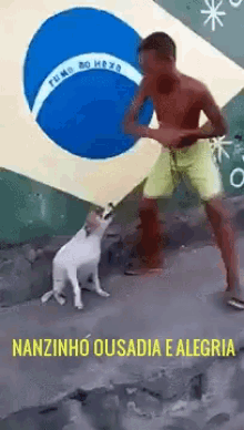 a man dancing with a dog in front of a brazilian flag with the words nanzinho ousadia e alegria on the bottom