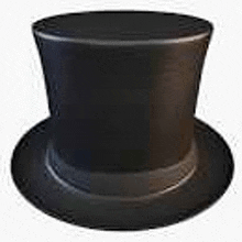 a black top hat is sitting on top of a white table .