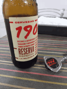 a bottle of cervezas 190 reserva especial is on a table