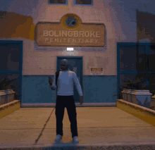 a man stands in front of a boilingbrooke penitentiary