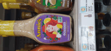 a bottle of annie 's goddess salad dressing sits on a shelf