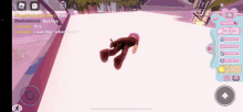 a screenshot of a video game shows a girl laying on the ground