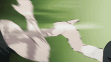 a blurry picture of a person 's arm being punched in the face