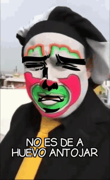 a man with a clown face painted on his face and the words no es de a huevo antojar below him