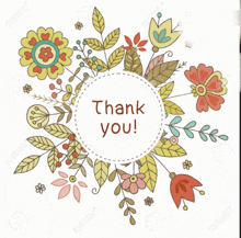 a thank you card with flowers and leaves around a circle