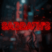 a sign that says sabbath 's in red neon