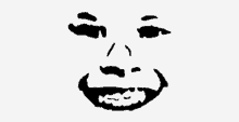 a black and white drawing of a face with a smile