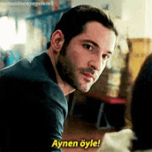 a man with a beard says aynen öyle