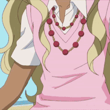 a girl with blonde hair and blue eyes wearing a pink vest and necklace