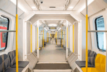 the inside of a subway car with a sign that says " exit "