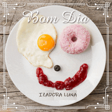 a white plate with a smiley face made out of food and the words bom dia izadora luna