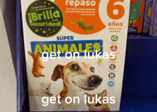 a book titled animales get on lukas has a dog on the cover