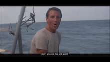 a man on a boat says " don t give me that shit point "