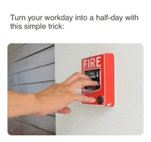 a hand is pressing a fire button on a white wall