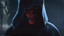 a close up of darth maul 's face with the words 2020 & tm lucasfilm ltd. behind him