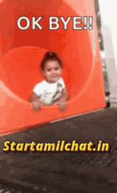 a little girl is sliding down an orange slide with the words ok bye
