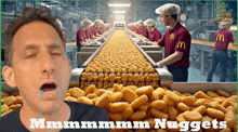 a man is crying in front of a conveyor belt filled with nuggets