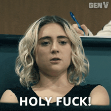 a woman says holy fuck in front of her face