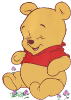 a winnie the pooh bear with his eyes closed and a red shirt on