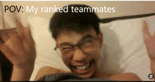 a man laying on a bed with the caption " pov : my ranked teammates " above him