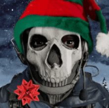 a skull wearing a santa hat with a red bow