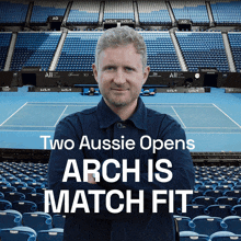 a man stands in front of a tennis court with the words " two aussie opens arch is match fit "