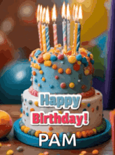 a birthday cake with lit candles and the words happy birthday pam