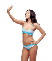 a woman in a bikini is taking a selfie