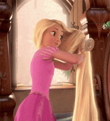 rapunzel from tangled is brushing her long blonde hair