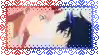 a man and a woman are kissing each other in a frame .