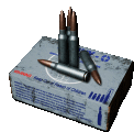 a box of bullets with three bullets on top of it .