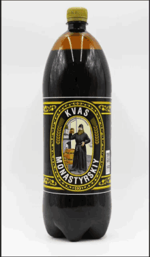 a bottle of kvas monastyrsky beer with a monk on the label