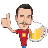 a man in a red shirt with a b on it is holding a beer mug and giving a thumbs up