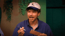 a man holds up a card that says idle