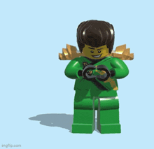 a lego ninjago character with green smoke coming out of his mouth .
