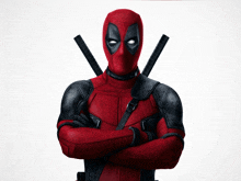 a man in a deadpool costume with his arms crossed and two swords behind his back