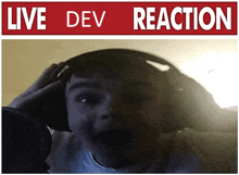 a person wearing headphones with a live dev reaction sign above them