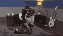 a man playing a guitar in a room with the name steve vai on the bottom