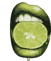 a close up of a woman 's mouth with a slice of lime coming out of it