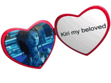 a heart shaped mirror with a picture of a woman and the words kiri my beloved on it