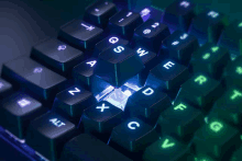 a close up of a keyboard with the letters z x and c visible