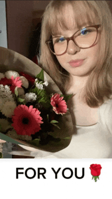 a woman wearing glasses is holding a bouquet of flowers and the words for you are above her