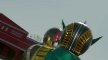 a blurred image of a cartoon character with a red building in the background that says ' 00000 ' on it