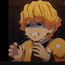 a cartoon character with yellow hair is crying with tears coming down his face