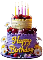a purple and yellow birthday cake with the words happy birthday written on it