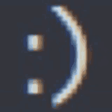 a pixelated smiley face on a dark background