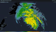 a radarscope screen shows a hurricane coming in to land