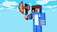 a minecraft character in a blue hoodie holding a sword