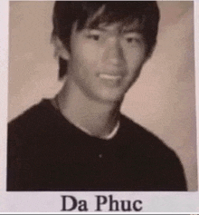 a black and white photo of a young man with the name da phục on the bottom